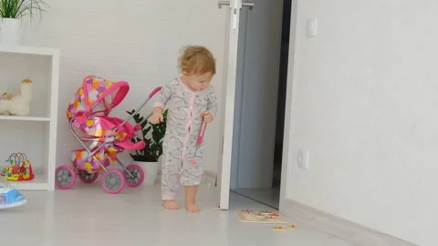 Baby is playing with the cat. Selective focus. Stock Footage 172551023