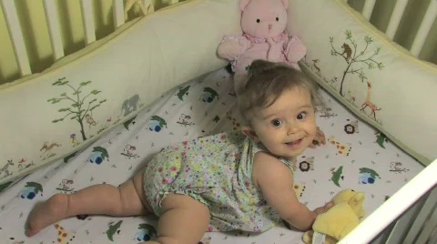 Baby Playing in Crib Video stock 677012
