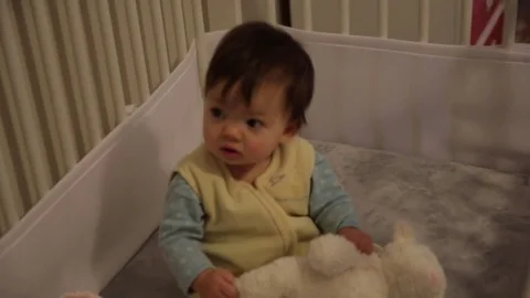 Baby Playing in Crib Stock Footage 85333680