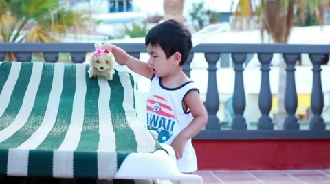 Baby Playing with dog puppet Stock Footage 40919713