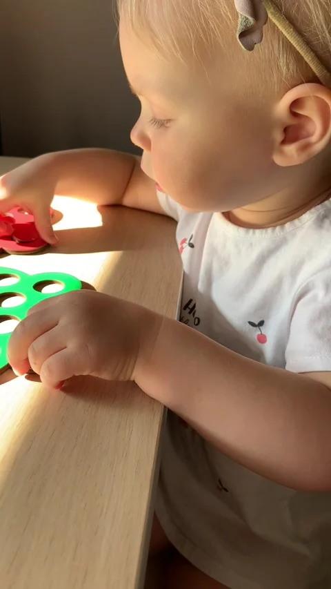 Baby is playing educational games Stock Footage 235443452