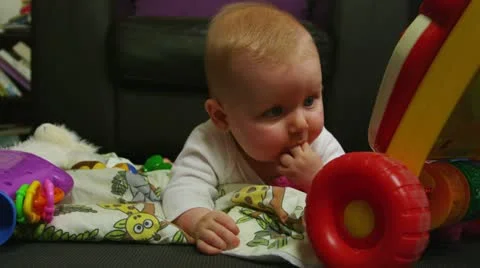 Baby playing Stock Footage 11136438