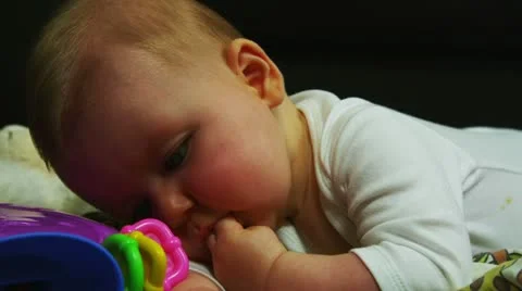 Baby playing Stock Footage 11136494