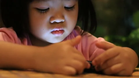 Baby playing with Smart phone Stock Footage 44720375
