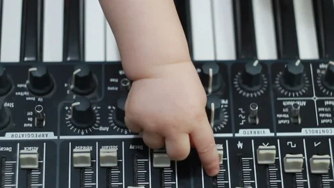 Baby Playing With Synth Stock Footage 96655699