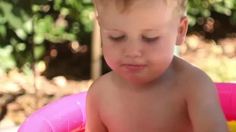 Baby in the pool Stock Footage 41690537