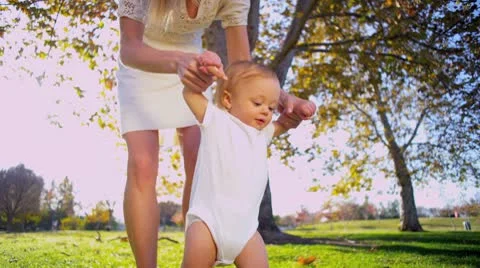 Baby Practicing First Steps Stock Footage 10704241
