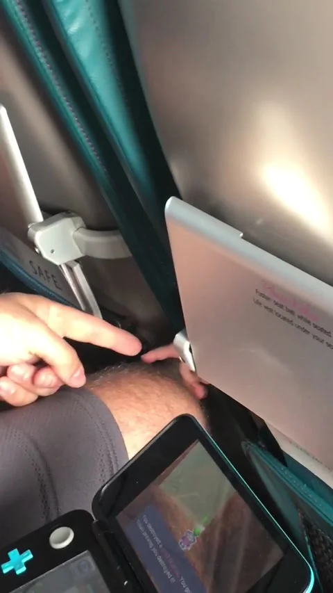 Baby Pulls at Leg Hairs on Plane, usa Stock Footage 205426458