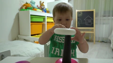 Baby puts pyramid Stock Footage 62776514
