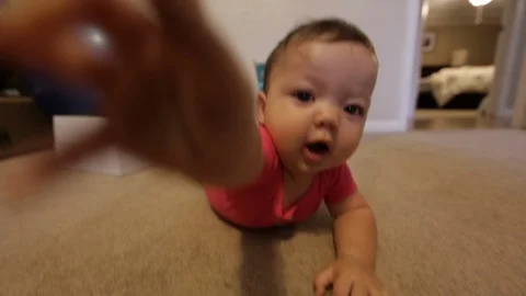 Baby Reaching for Camera Stock Footage 91331523