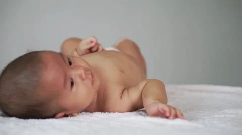 Baby Rolling Over Stock Footage 68339637
