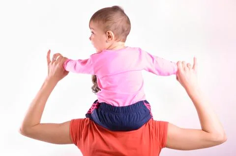 Baby on shoulders Stock Photos