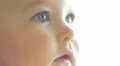 The baby side shot close-up portrait. Cute yawn. Shot with Red Cinema Camera 4k or 4k+ Resolution