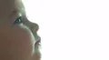 The baby side shot close-up portrait. Shot with Red Cinema Camera 4k or 4k+ Resolution