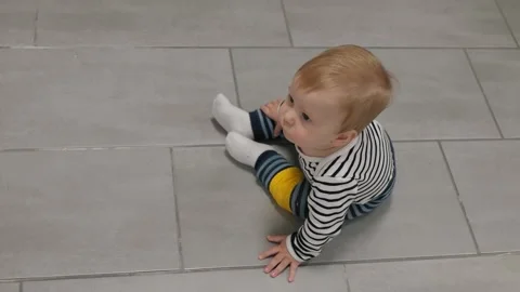 Baby sitting floor Stock Footage 282441516