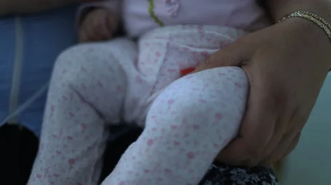 Baby sitting on hands Stock Footage 41753026