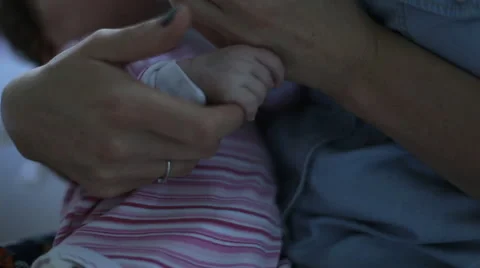 Baby sitting on hands Stock-Footage 41753571