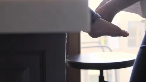 Baby Sitting On The Kitchen Table Stock Footage 114769766