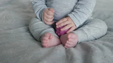 Baby Sitting on Soft Blanket Stock Footage 289673286
