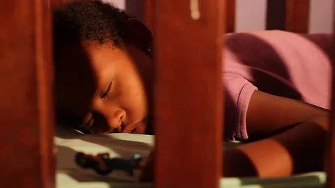 Baby sleeping in crib Stock Footage 69229399