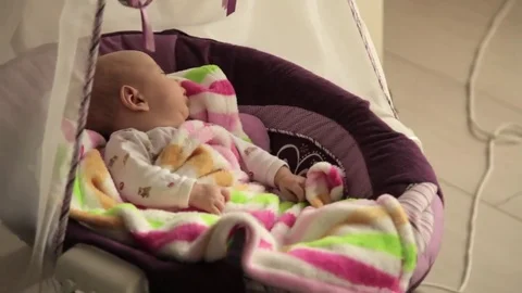 Baby sleeping in crib 動画素材 70678416