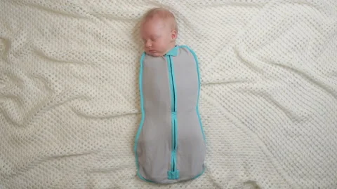 Baby sleeping on his bed Stock Footage 220360935