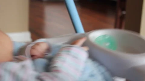 Baby sleeping in a swing Stock Footage 54398210