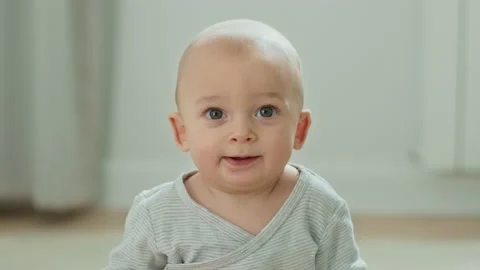 A baby is smiling Stock Footage 143351174