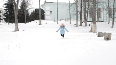 Baby snowballs fun 2 Stock Footage 86232172