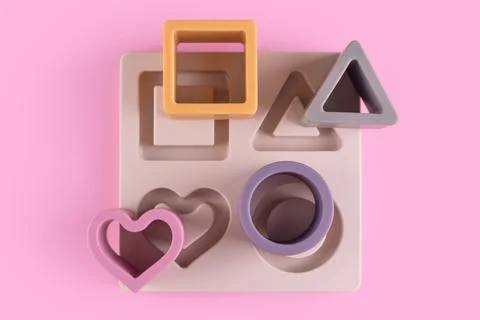 Baby soft nesting sorting ans stacking toy for arranging by color and geometr Stock Photos