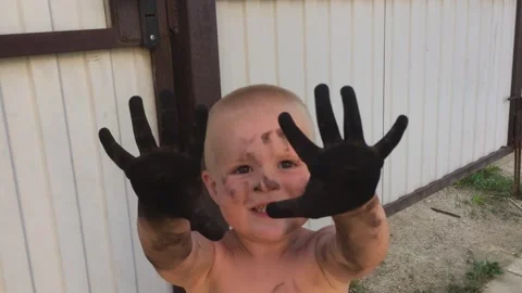 Baby in soot Stock Footage 200364176