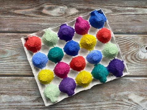 Baby sorting, a game for the development of a child from an egg box. Stock Photos