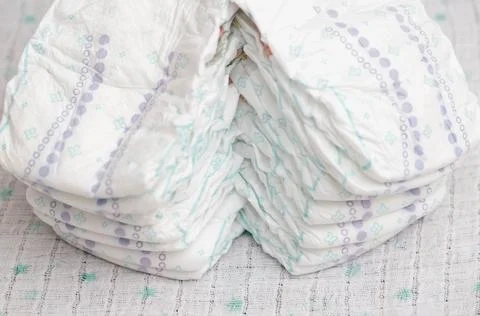 Baby stack with diapers on a white background, close-up. Dermatologically Foto stock