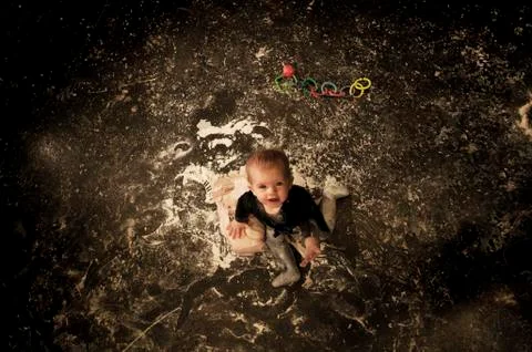 Baby in studio playing Stock Photos
