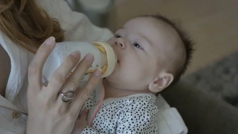 Baby sucking bottle Видео 80447449