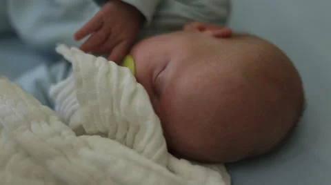 Baby sucks a pacifier Stock Footage 41752660