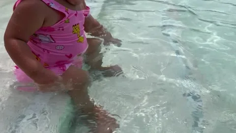 Baby on the swimming pool  Stock Footage 154336656
