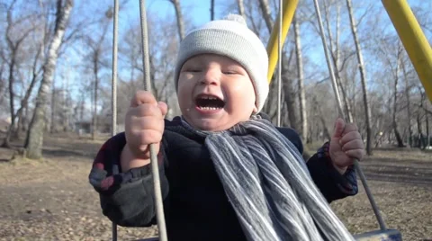 Baby on a swing Stock Footage 49308009