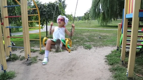 Baby on the swing Stock Footage 78004344