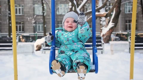 Baby on the swing Stock Footage 147975884