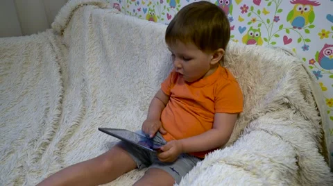 Baby with tablet Stock Footage 62951917