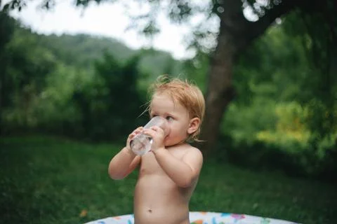Baby taking a bath Stock Photos
