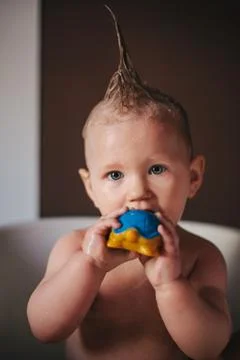 Baby taking a bath Stock Photos