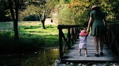 Baby taking first steps Stock Footage 67646275