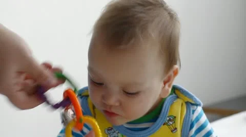 Baby with toy 스톡 동영상 10726526