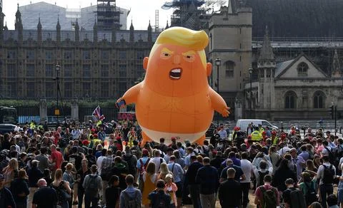Baby Trump Blimp protest in parliament square in London, United Kingdom - 13 Jul Stock Photos
