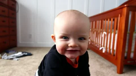 Baby trying to stand Stock Footage 20607933