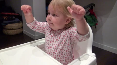 Baby trying to touch camera Stock Footage 56161531