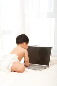 Baby "Using" a Computer Stock Photos