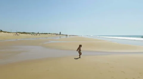 Baby walking at beach Stock Footage 58255977